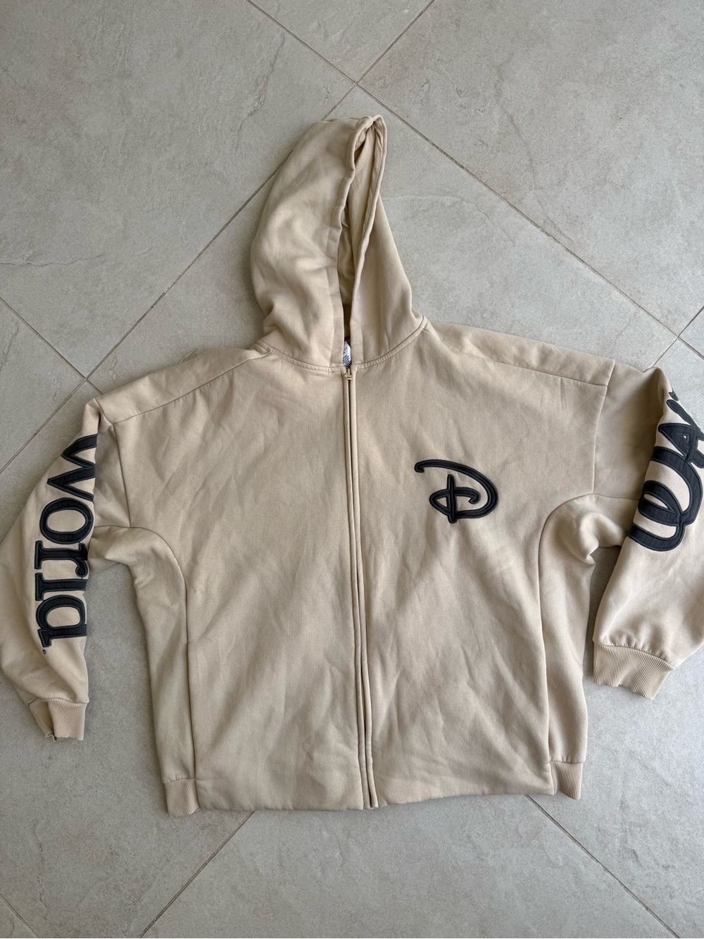 Disney Beige Zip-Up Hoodie with Black Logo
